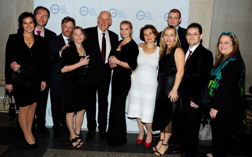 Robert Lourie (center) with a group of colleagues from Renaissance Technologies LLC.