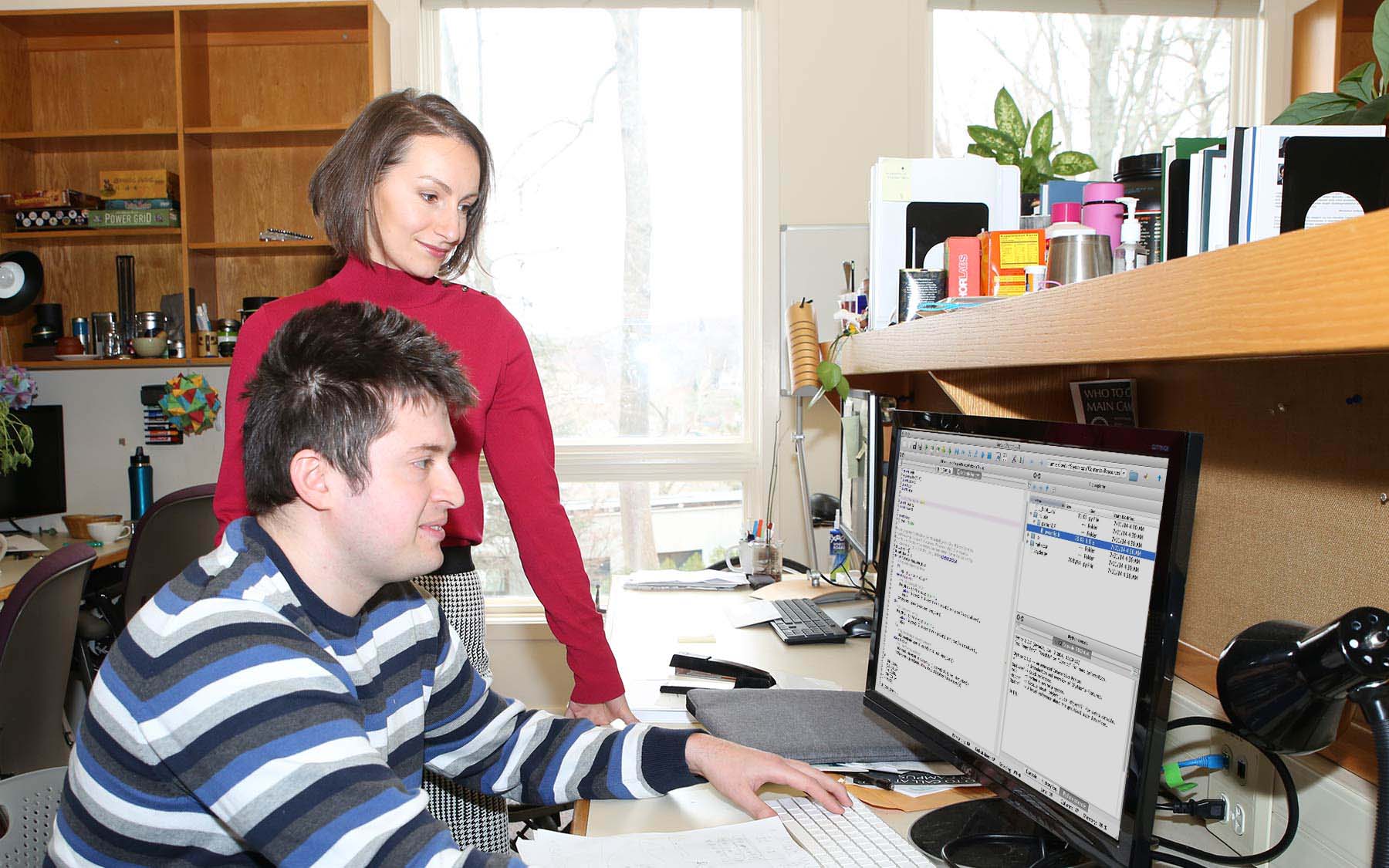 Computational Postdoc Mikhail Genkin and Tatiana Engel