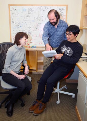 photo of David McCandlish Anna Posfai and Juannan Zhou in the lab