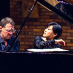photo of pianists Stephanie Ho and Saar Ahuvia