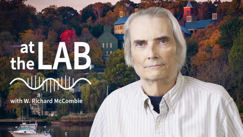 image of Cold Spring Harbor campus from across the harbor with At the Lab podcast logo and portrait of Dick McCombie