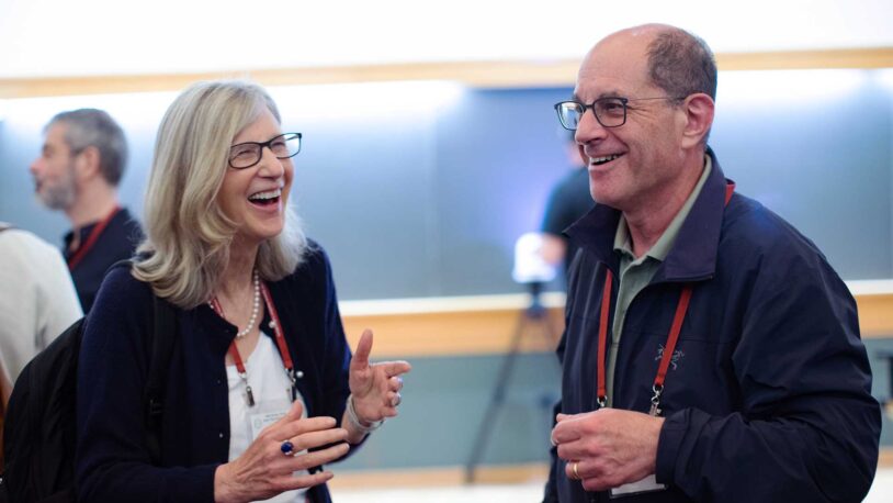 photo of Holly Ingraham and David Julius at the CSHL Symposium