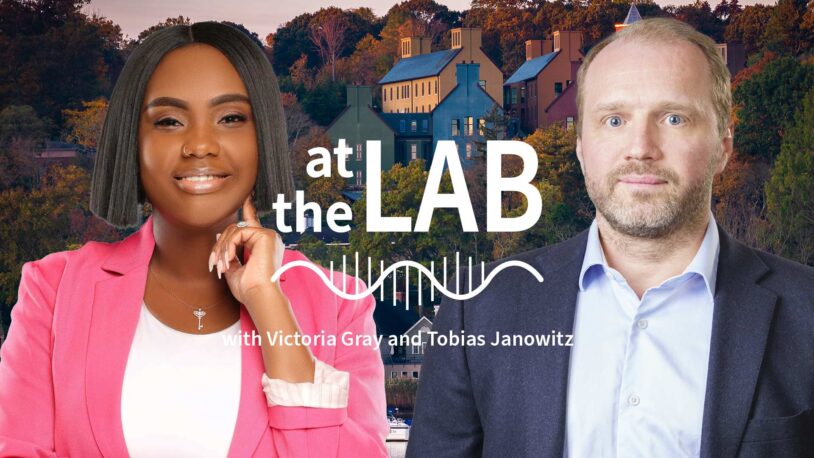 image of Cold Spring Harbor campus from across the harbor with At the Lab podcast logo and portrait of Victoria Gray and Tobias Janowitz