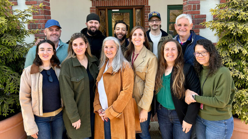 photo of Jorge family with Bruce Stillman and Camila dos Santos