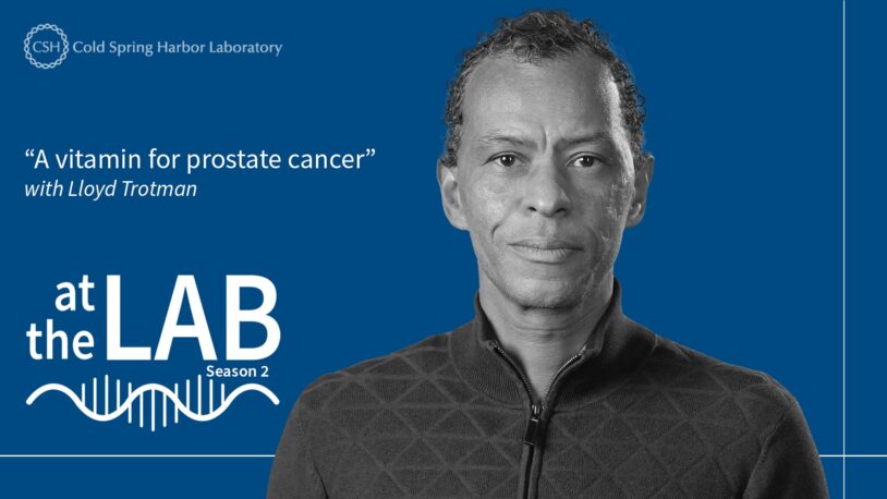 image of the At the Lab podcast logo with black and white portrait of Lloyd Trotman on a blue background