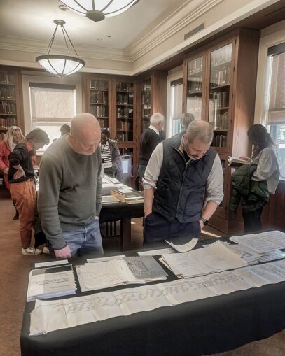 Image of guests viewing items at CSHL's Love Data Week Exhibition